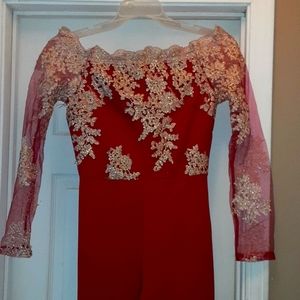 Gorgeous red and gold, off shoulder, flare bottom, one piece pant suit.